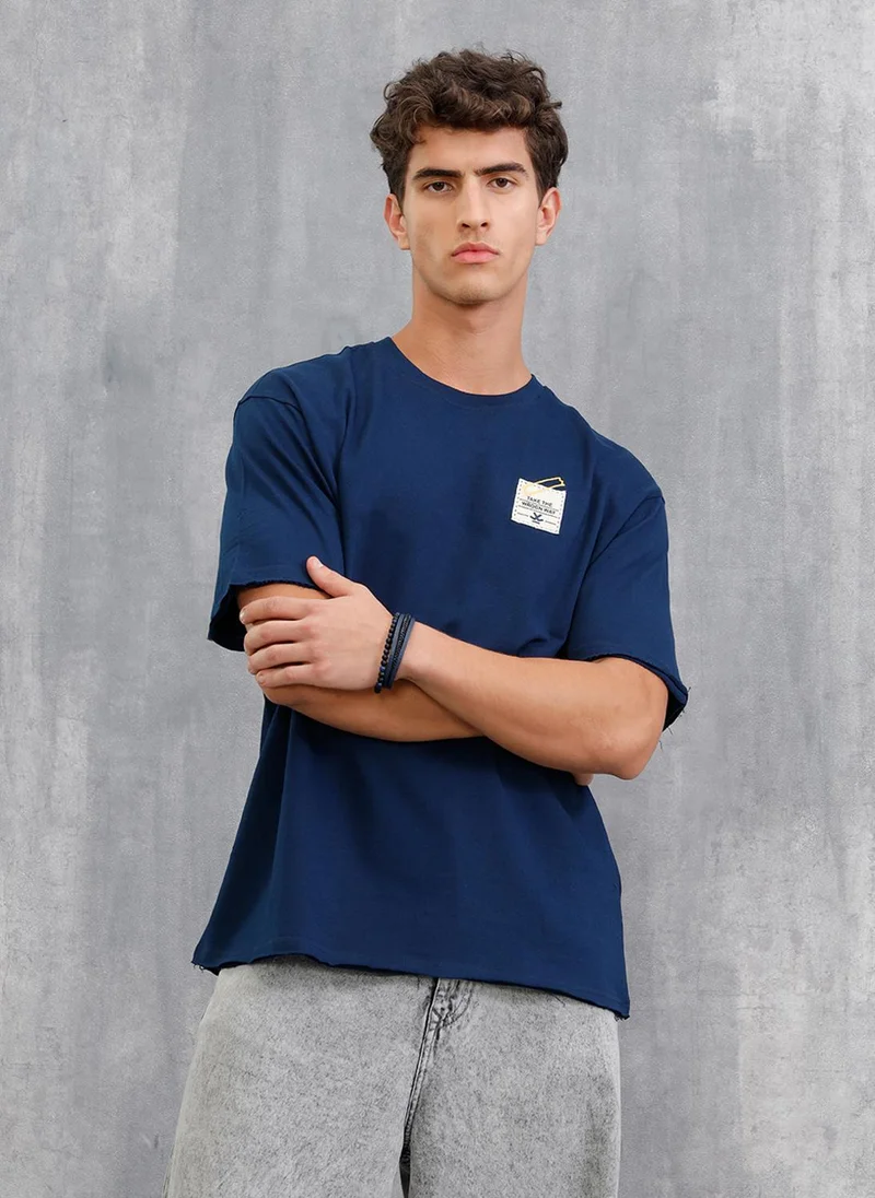 Wrogn Solid Oversized T-Shirt With Printed Canvas Patch And Raw Edge Detail | Navy